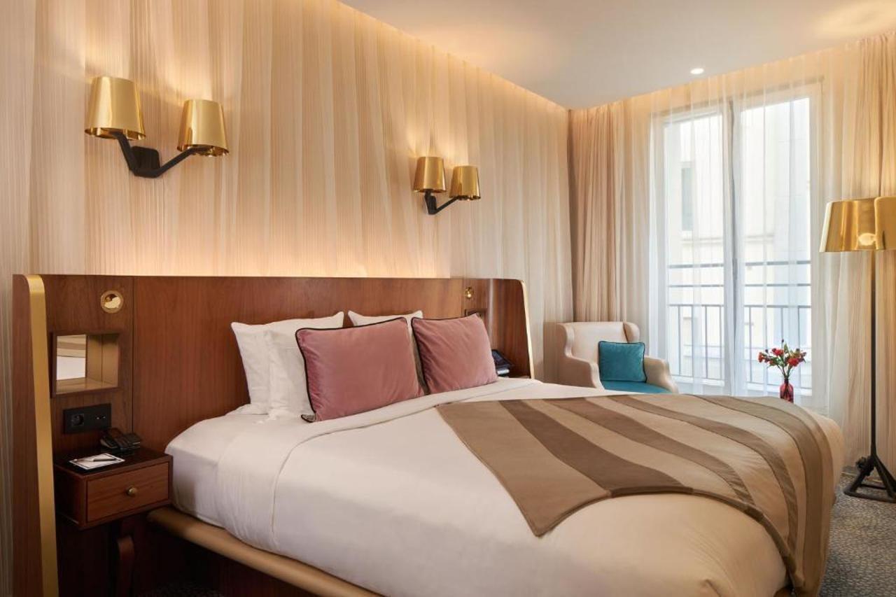 Maison Albar Hotels Le Pont-Neuf Paris Exterior foto A bedroom at the hotel